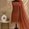 MJ209 (2) Bronze Unstitched Dress Material for Women with embroidered net top, rayon bottom and matching net dupatta