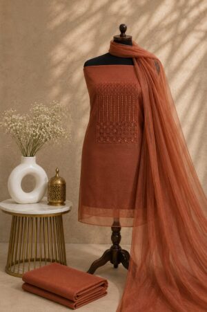 Bronze Unstitched Dress Material for Women with embroidered net top, rayon bottom and matching net dupatta