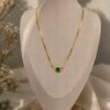 Green Crystal Gold Short Chain Necklace for Women featuring a radiant green crystal and elegant gold-tone chain